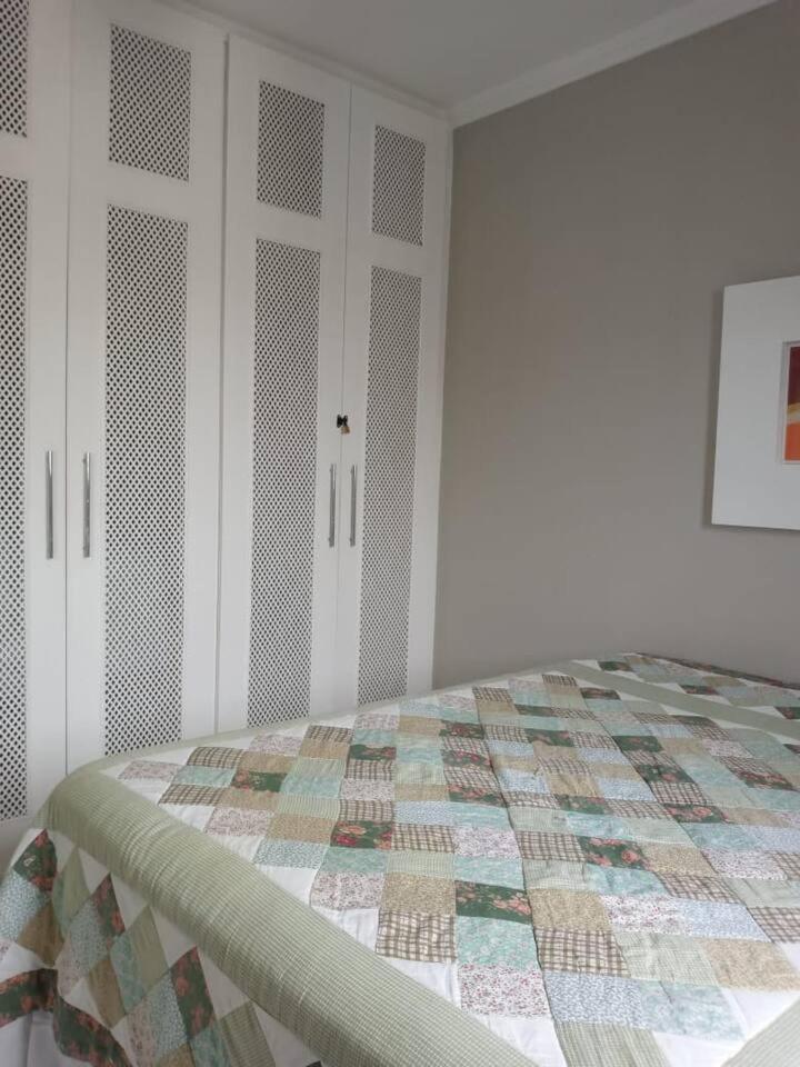 Apartamento completo na calçada da praia Appartement Guarujá Buitenkant foto