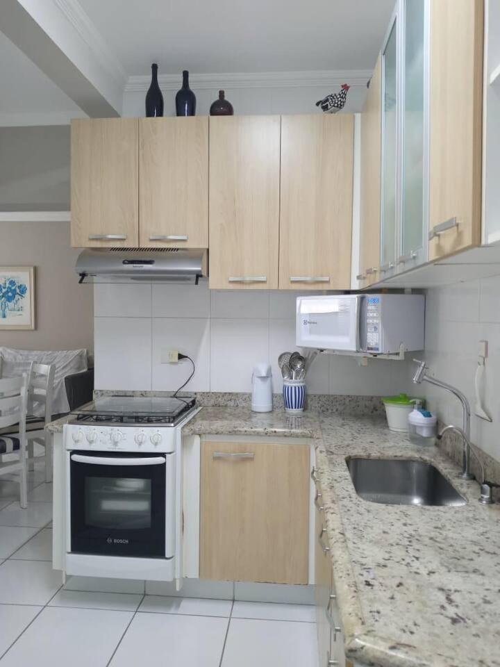 Apartamento completo na calçada da praia Appartement Guarujá Buitenkant foto